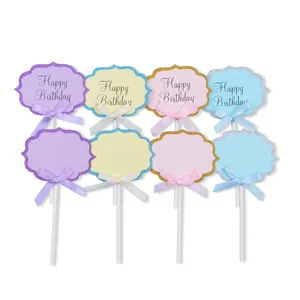 Set of colorful DIY paper cake toppers with Happy Birthday message for party decoration