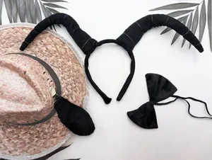 Detailed macro view of the black ox horn headband costume set with bow tie and tail
