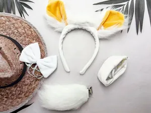 Detailed view of white plush sheep ear headband set with matching bow tie and tail