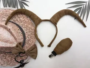 Detailed view of the brown plush antelope horn headband with matching bow tie and tail
