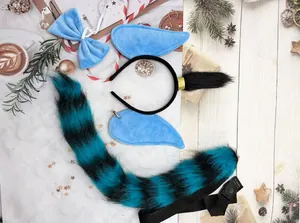Close-up of handmade blue and black striped plush animal tail and ears for cosplay