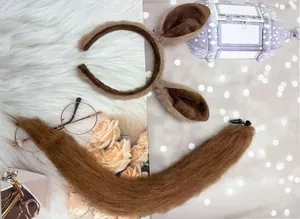 Close-up of brown donkey ears headband and fluffy tail costume set for Halloween cosplay