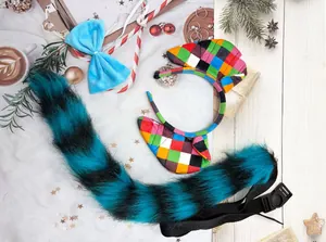 Detailed view of handmade plush beast tail, checkered ears, and blue bow set