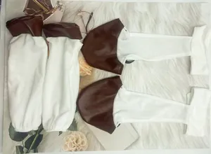Close-up detail of Halloween donkey costume leg covers and plush hoof-style gloves set