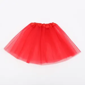 Detailed view of layered red tulle tutu skirt for performance and costume dress-up