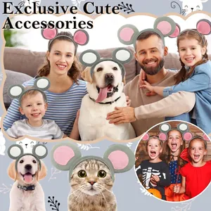 Detailed view of family and pets wearing cute plush mouse ear headbands for Halloween