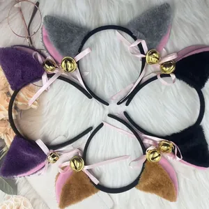 Set of plush cat ear headbands with gold bells and pink bows in multiple colors.