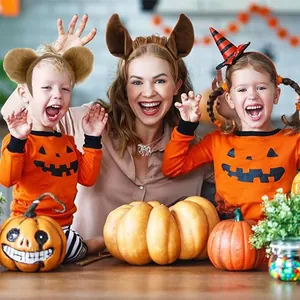 Family in Halloween costumes wearing animal ear headbands during a holiday party