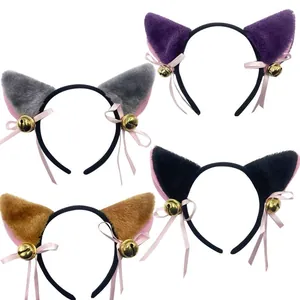 Close-up view of plush cat ear headbands in four colors with golden bells and ribbons