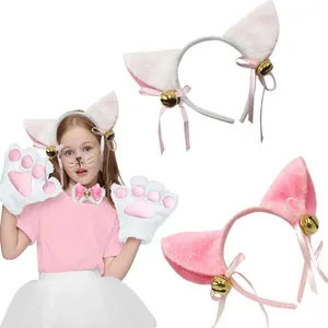 Detailed view of plush cat ear headband set with bells and bow accessories