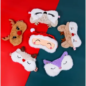 Cute Christmas plush sleep masks featuring Santa and reindeer designs on red background