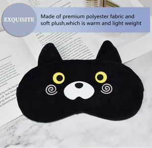 Detailed macro view of cute cartoon cat eye mask made of premium soft black plush