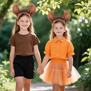 Two kids wearing funny animal ear headbands for Halloween cosplay costume in a lush garden.