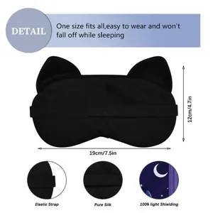 Detail view of black cat sleep mask with 19x12cm dimensions and pure silk material