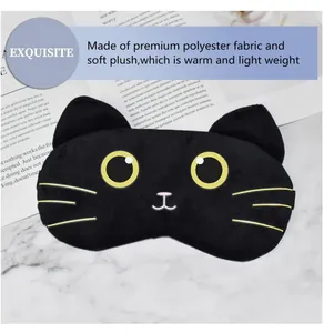 Close-up of cute black cat plush eye mask made of soft premium polyester fabric.