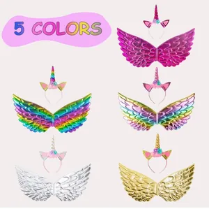 Set of five colorful unicorn headbands and shiny metallic wings for kids costume parties