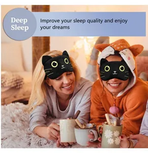 Two friends wearing cute black plush cat eye masks while relaxing in a cozy bedroom