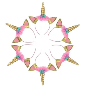 Circular arrangement of six golden unicorn headbands with pink mesh and flowers for parties
