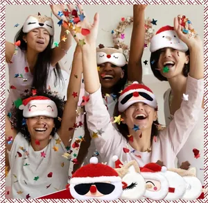 Festive plush Christmas eye masks featuring Santa Claus and reindeer designs in party scene