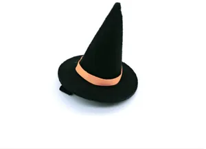 Close-up of a black mini witch hat hair clip with orange band for Halloween