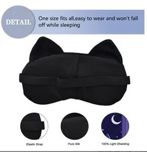 Close-up of black plush cat ear eye mask featuring elastic strap and pure silk lining