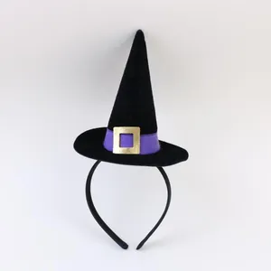 Detailed close-up view of a miniature black witch hat headband for Halloween costumes
