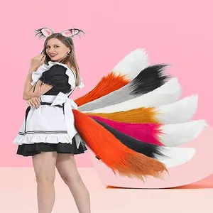 Detail of multi-colored faux fur fox tails and matching ears for anime cosplay costume