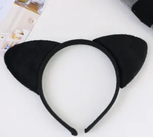 Detailed macro shot of a soft plush black cat ear headband for costume party outfits