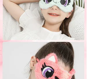 Detail of cute plush owl sleep mask on child for soft comfort and light blocking.