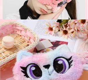 Detailed view of soft plush cartoon cat eye mask with vibrant rainbow faux fur