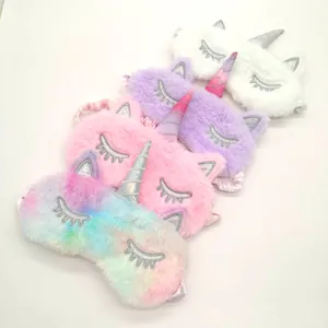 Set of four colorful plush unicorn sleep masks with cute embroidery details and soft fur