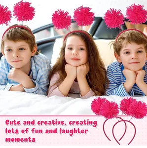 Three happy kids wearing cute pink pom-pom headbands in a cozy playful bedroom setting.
