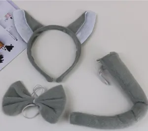 Close-up of a three-piece grey plush animal costume set including ears, bow, and tail
