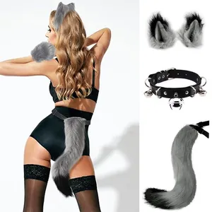 Detail view of faux fur fox tail, ears and bell collar cosplay costume set.