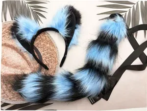 Detail view of blue and black striped faux fur fox ears headband and tail set for cosplay costume
