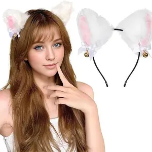 Detail view of plush white cat fox ear headband with white bows and golden bells for cosplay