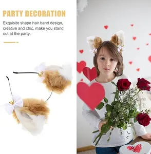 Child wearing fluffy fox ear headband with white bows and bells for party decoration