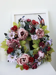 Close-up of vintage artificial peony wreath for rustic wedding or home decor