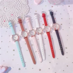 Detailed view of girls' watches with cute cat-ear dials and colorful leather straps