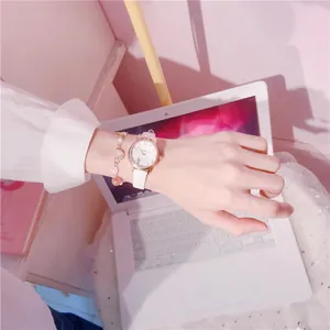 Elegant white quartz watch for girls with a matching heart charm bracelet gift set.