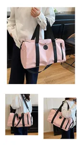 Model wearing pink large gym bag with wet dry separation for short travel or yoga session