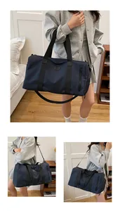 Detailed lifestyle view of a large navy blue travel duffel bag for fitness and yoga