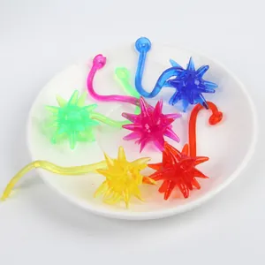 Detailed close-up showing texture of colorful soft glue sticky meteor hammer toys on plate