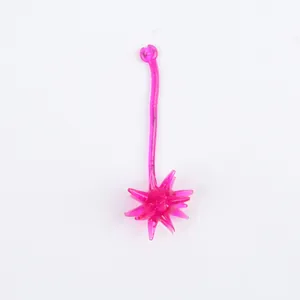 Macro detail of the sticky pink soft rubber meteor hammer toy texture