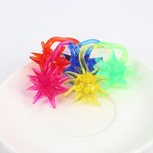 Colorful translucent spiky sticky meteor hammer toys in a variety of vibrant shades