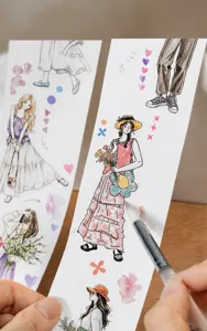 Close-up view showing the detail of watercolor girl character die-cut washi tape