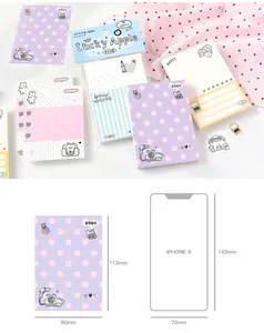 Size comparison of a cute 80-sheet doodle polka dot memo pad against an iPhone X model.