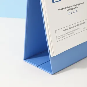 Calendario da tavolo minimalista coreano 2027 con base azzurra per decorazione ufficio
