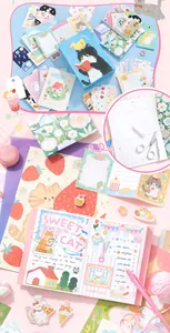 Coffret de papeterie chat mignon avec autocollants et blocs-notes pour le scrapbooking.