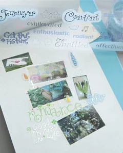 Close-up of premium PET decorative tape featuring silver stamping on a creative journal page